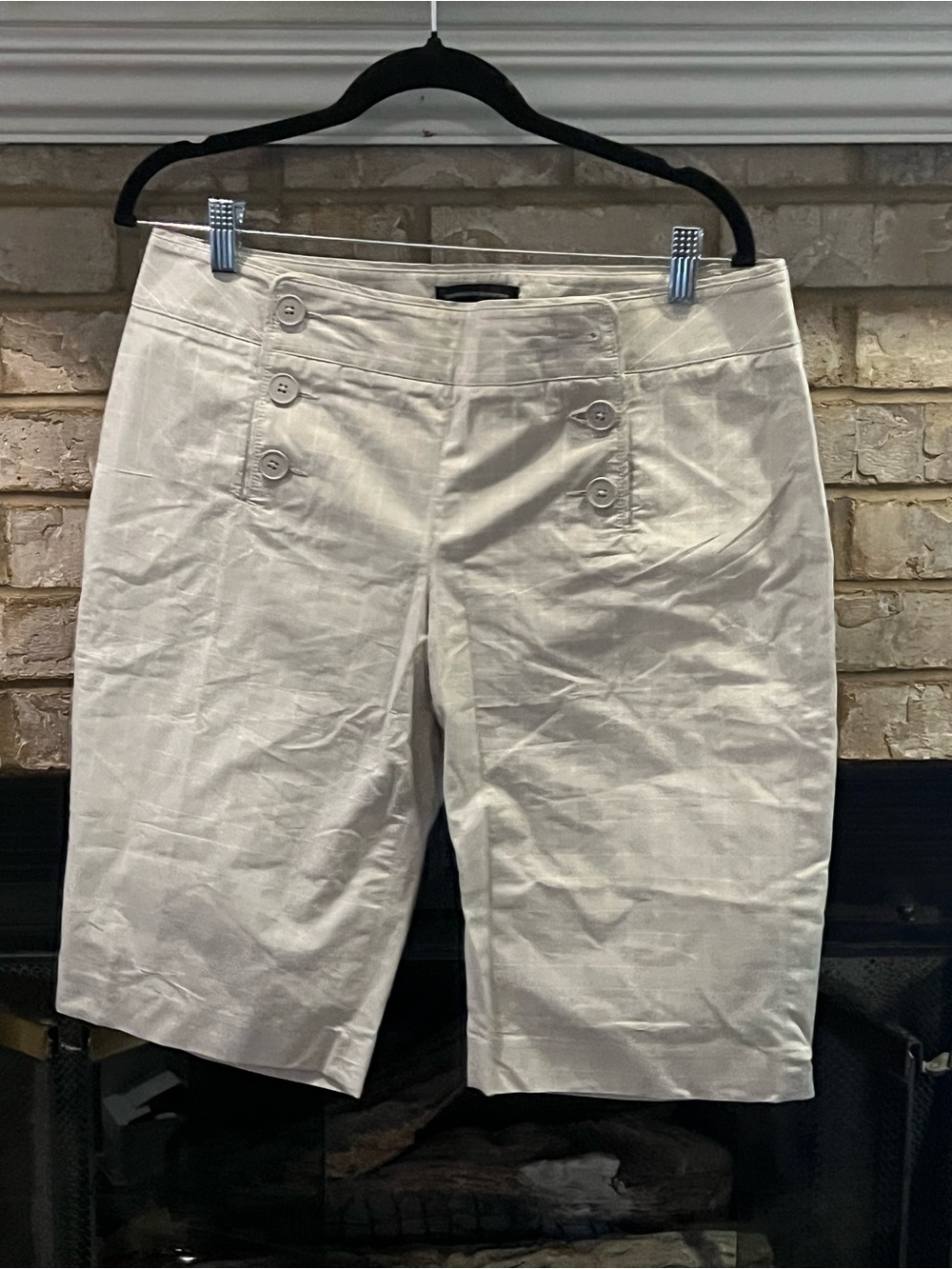 Womenโs Cream Button-Accent pants below the knee